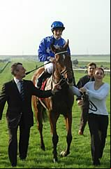 Pride and Christophe Lemaire parading in front of the stands following their impressive victory in the Champion Stakes